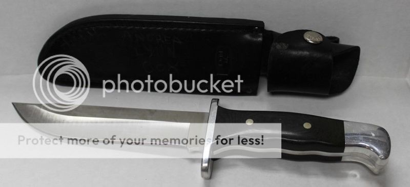buck-knife-124-frontiersman-micarta-handle-heritage-fixed-blade-w-leather-sheath-29fa1977b09afea48a9b18f1c394efef_zpsan0to52m.jpeg